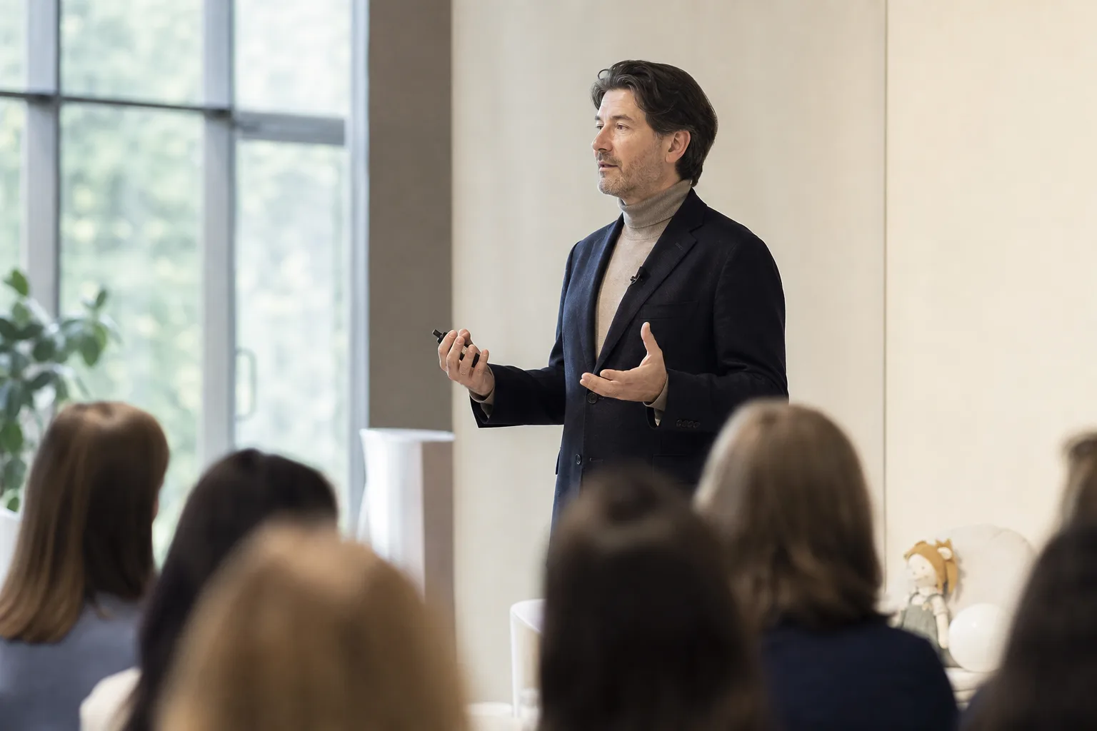 Eduard Sergeyevich Pervushkin giving a talk at the Motherhood Celebration